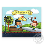 Sunny Studio Stamps Spring Showers Girl with Chick Umbrella and Boy with Butterfly Net at the Park Handmade Card by Mendi