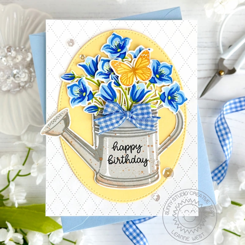 Sunny Studio Stamps Blue & Yellow Bluebell Flowers in Watering Can Spring Birthday Card using Stitched Oval Metal Craft Dies
