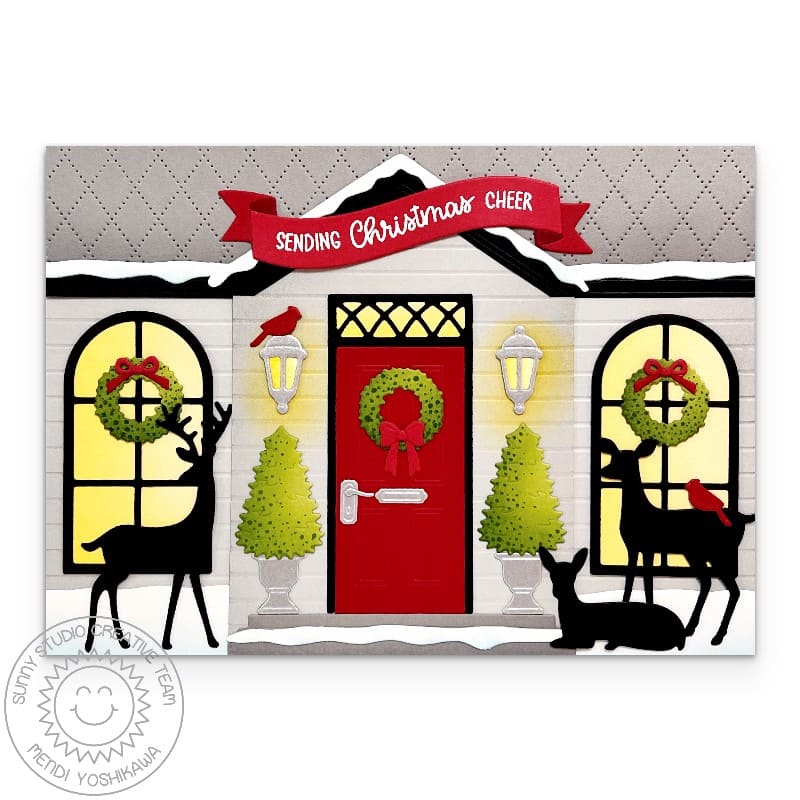 Sunny Studio Christmas-themed holiday house card with Front door, glowing windows, wreaths, deer, & cardinal birds