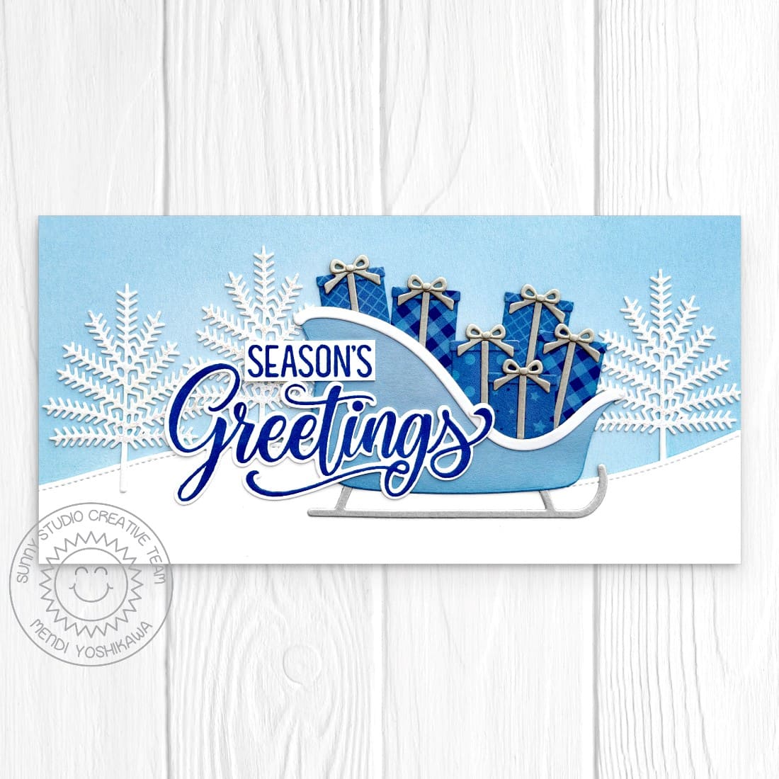 Sunny Studio Stamps Blue Sleigh with Snowy Trees Slimline Holiday Christmas Card using Sleigh Ride Surprise Metal Craft Dies