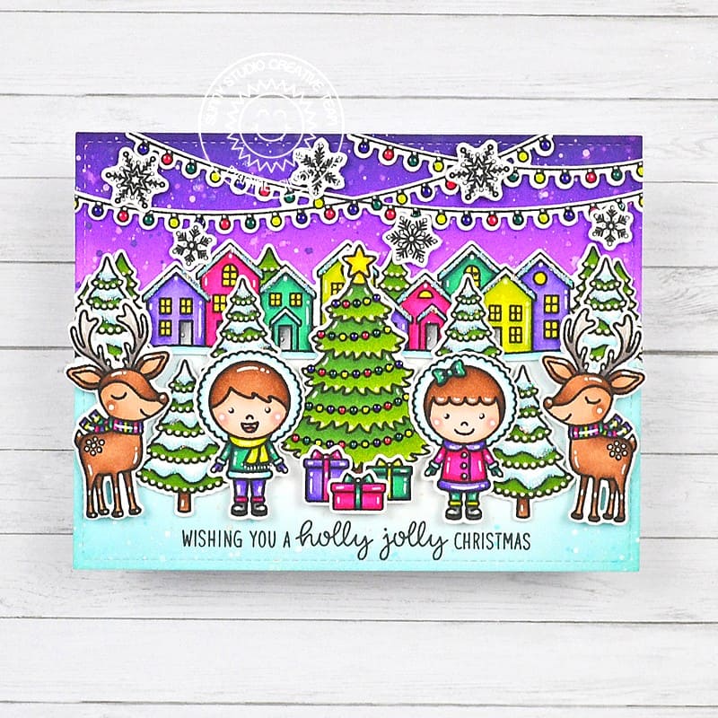 Sunny Studio Kids & Reindeer with Decorated Holiday Houses Holly Jolly Christmas Card using Toasty Hugs Clear Craft Stamps