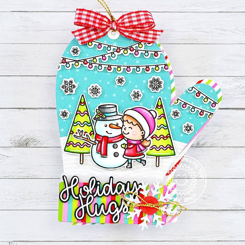 Sunny Studio Holiday Hugs Girl with Snowman Mitten Shaped Christmas Gift Tag Card using Snow One Like You Clear Stamps