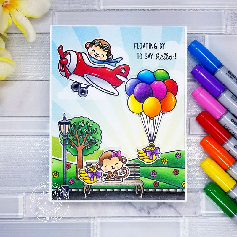 Sunny Studio Stamps Monkey with Bananas tied to floating balloons at the Park Handmade Greeting Card (using Spring Scenes Border 4x6 Clear Photopolymer Stamp Set)