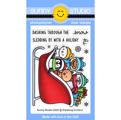 Sunny Studio Sledding Critters 3x4 Clear Photopolymer Stamps featuring seal, penguin, alpaca, cat & sheep dog in sleigh
