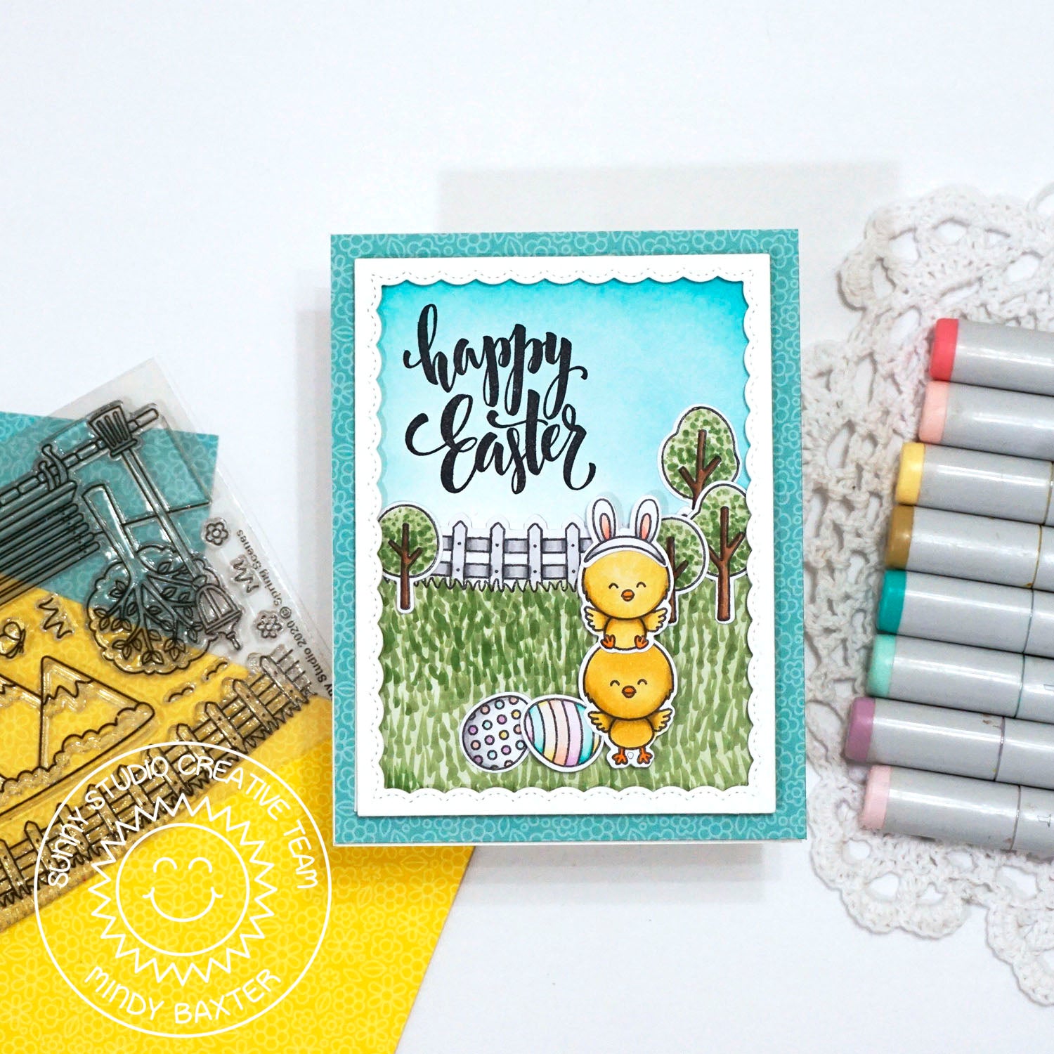 Sunny Studio Happy Easter Stacked Chicks outside with Trees, Grass & Eggs Handmade Card using Chickie Baby Clear Clear Stamps