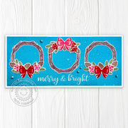 Slimline Merry & Bright Christmas card featuring three holiday vine wreaths decorated with bows, poinsettias, and pinecones.