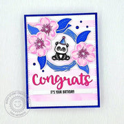 Stamped card featuring a panda bear sitting in a wreath with cherry blossoms and the phrase "Congrats! It's Your Birthday."