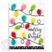 Sunny Studio Christmas card featuring a die-cut string of rainbow holiday lights with a stamped Merry & Bright greeting.